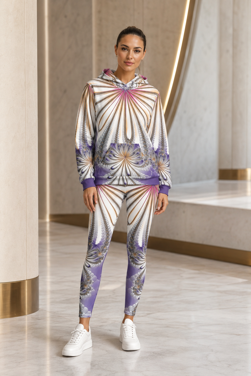 Model wearing matching ZKoriginal fractal-art hoodie and leggings as a luxury activewear look